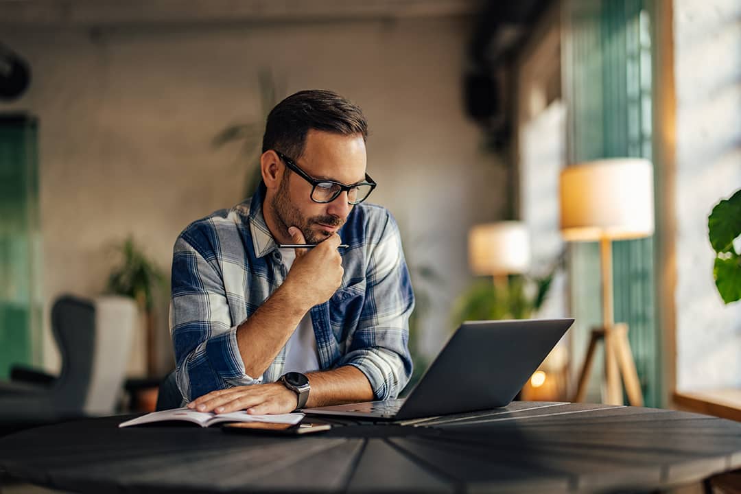 A focused businessman working on a project.